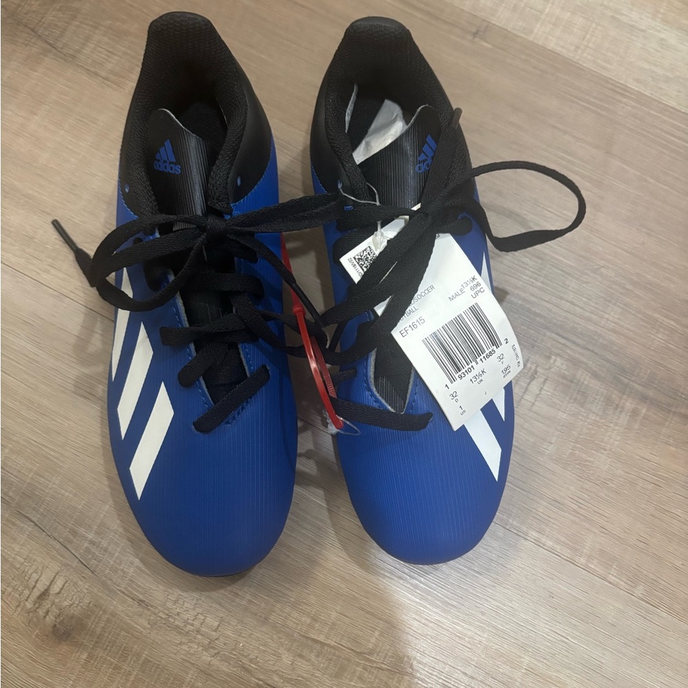 Adidas Kids Royal Blue soccer cleats with White Stripes